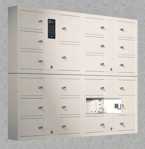 Woman selects a key from a Key Box System
