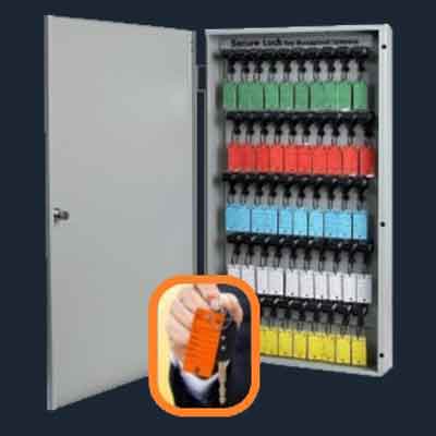 Woman selects a key from a Key Box System
